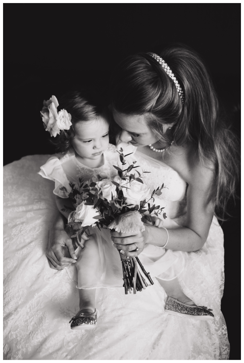 Mother Daughter portrait smelling beautiful bouquet 