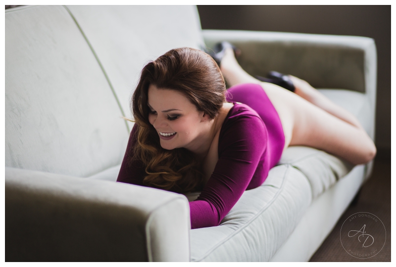 Boudoir Photo in purple bodysuit 